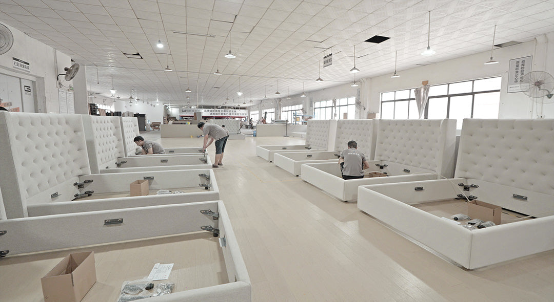Upholstered beds being assembled in the Gainsville bed workshop